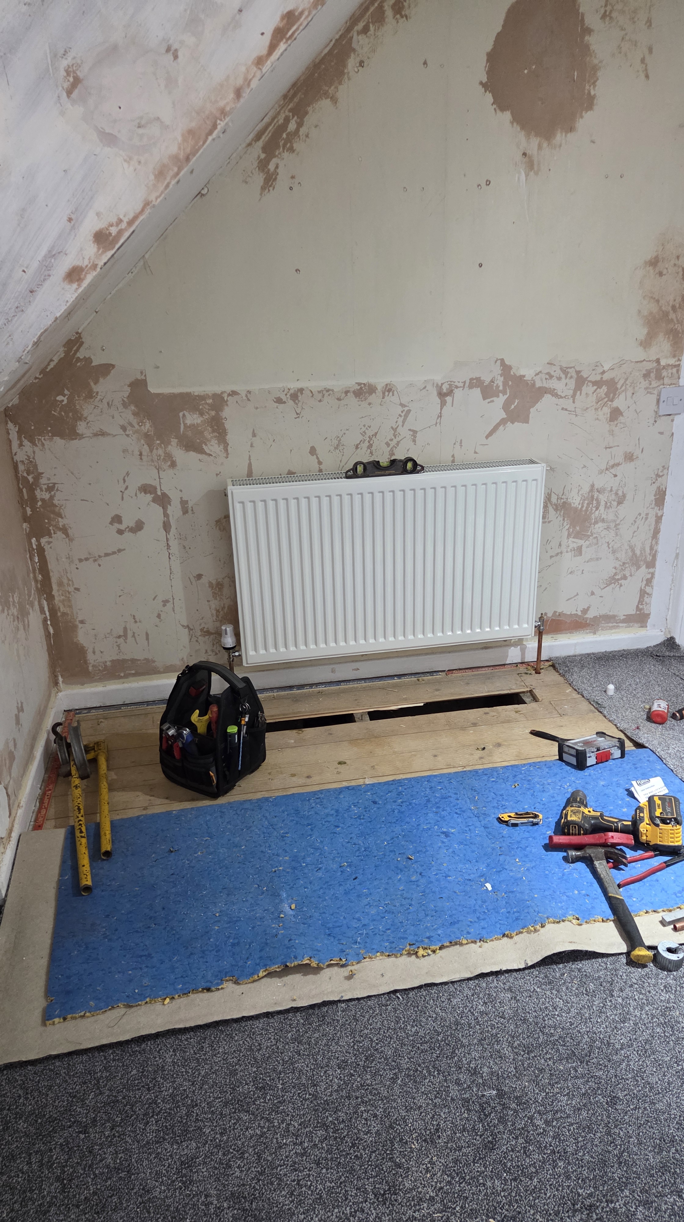 Radiator being installed